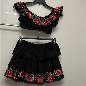 Elegant Black Skirt Set with Red Floral Design